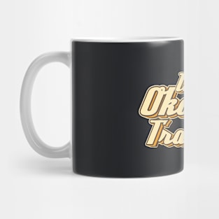 World's okayest Traveler typography Mug